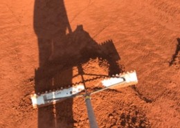 Tennisplatz harken